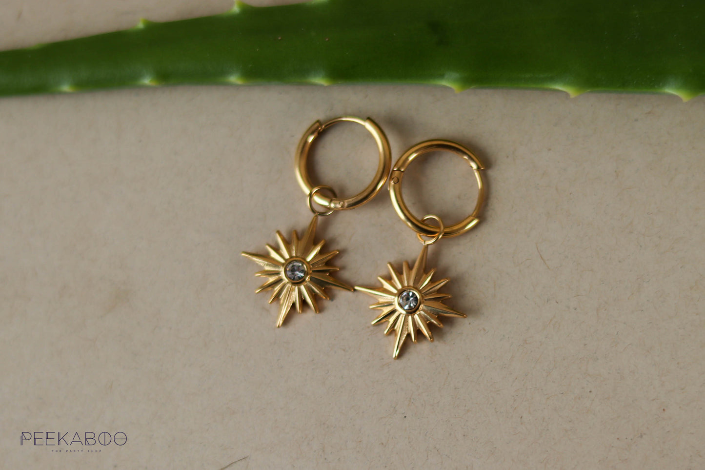 Arracada estrella diamante