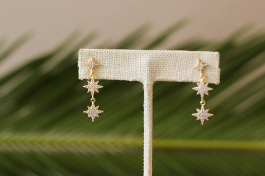 Arete estrellas colgantes